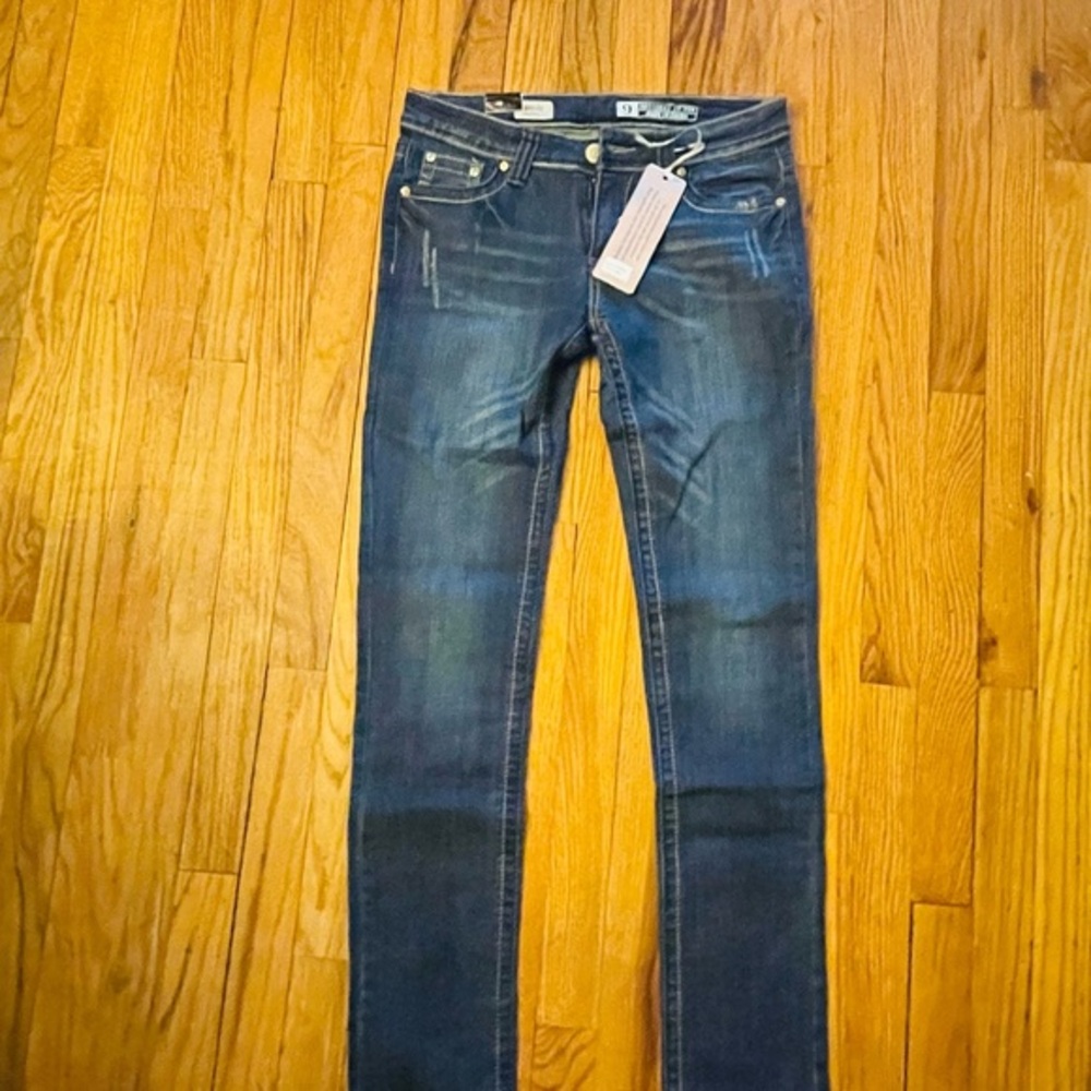 Puzzle Jeans Rhinestone pockets.Size 9 juniors